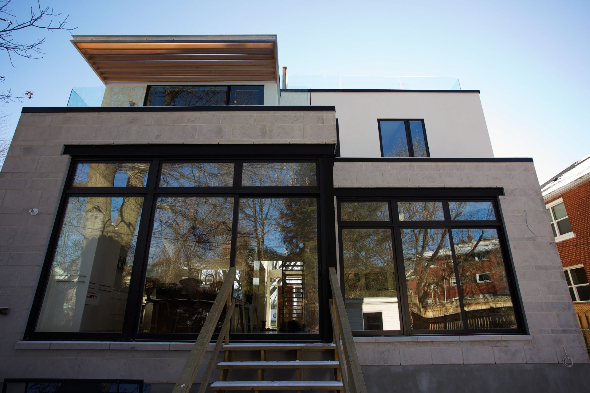 Exterior black-frame window installation