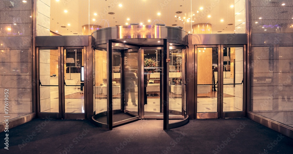 Modern commercial reception area with glass