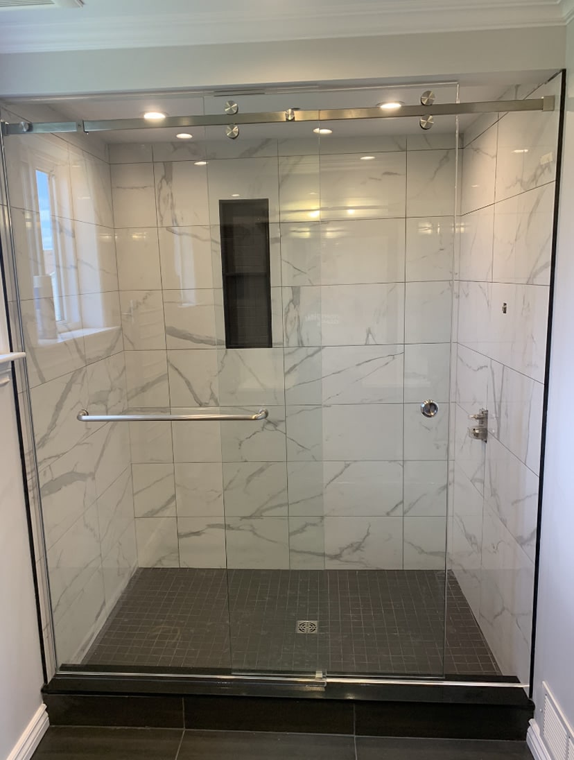 Corner shower glass installation