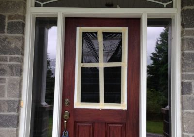 Residential door with decorative glass