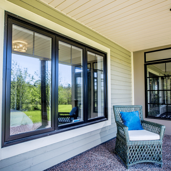 Black-framed thermopane window on a porch