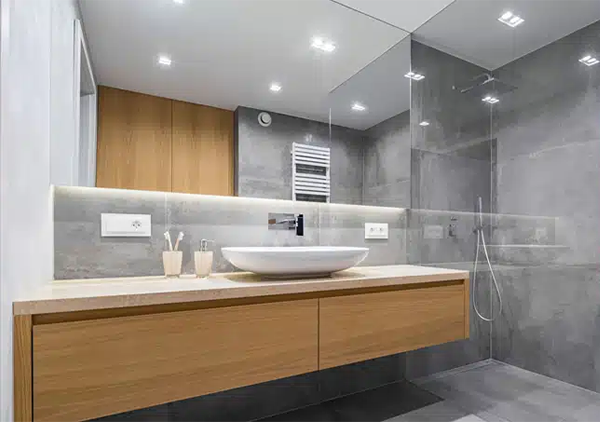 Modern bathroom vanity and glass shower wall